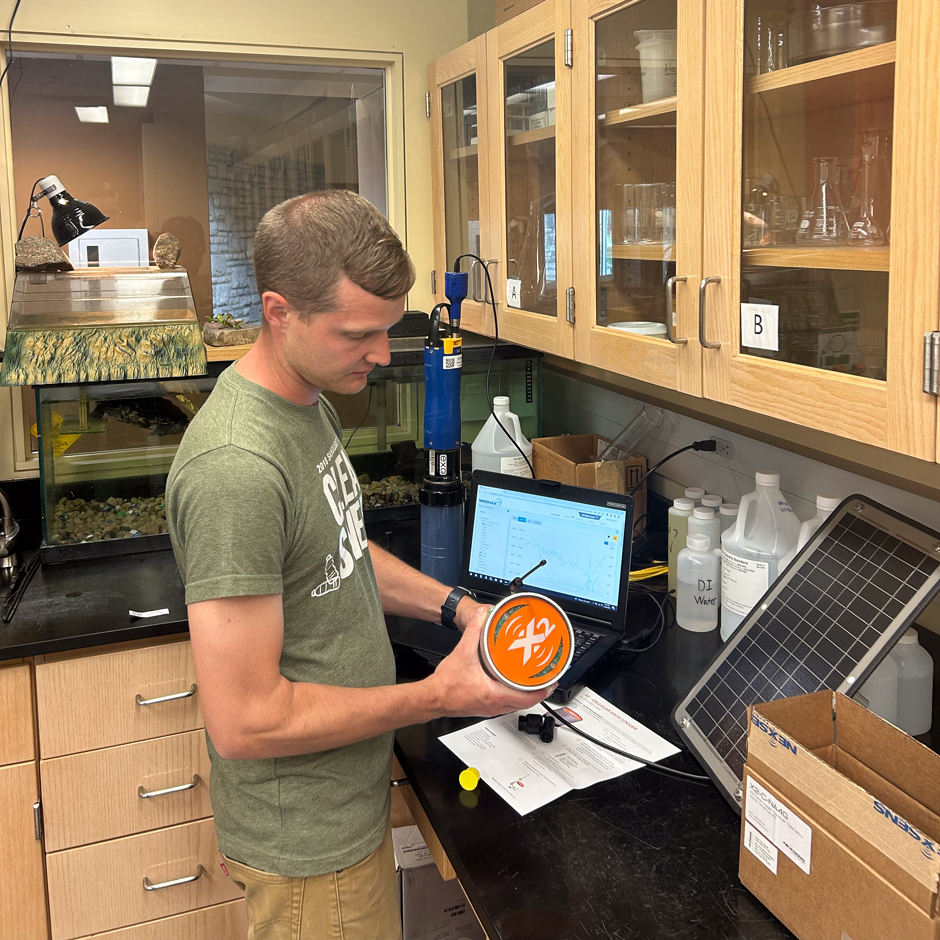 Boehler is working on setting up a NexSens X2 data logger for field deployment at an H2Ohio wetland in Seneca County, Ohio. This site will have two NexSens X2 loggers set up with sondes that will allow the research team to assess changes in water quality upstream and downstream of a wetland in the floodplain of Wolf Creek.