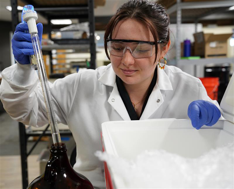 A ecoSPEARS employee working in the lab