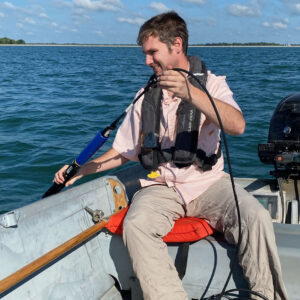 A water research analyst prepares an EXO1 Sonde for spot sampling.