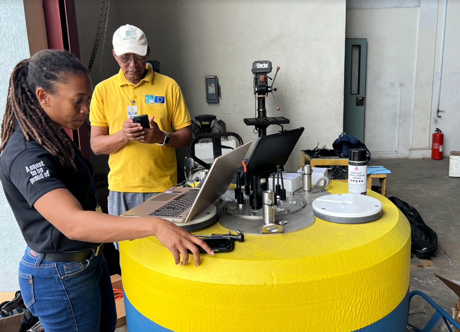 Albert Jones and a CCCCC technician setting up the CB-950 before deployment.