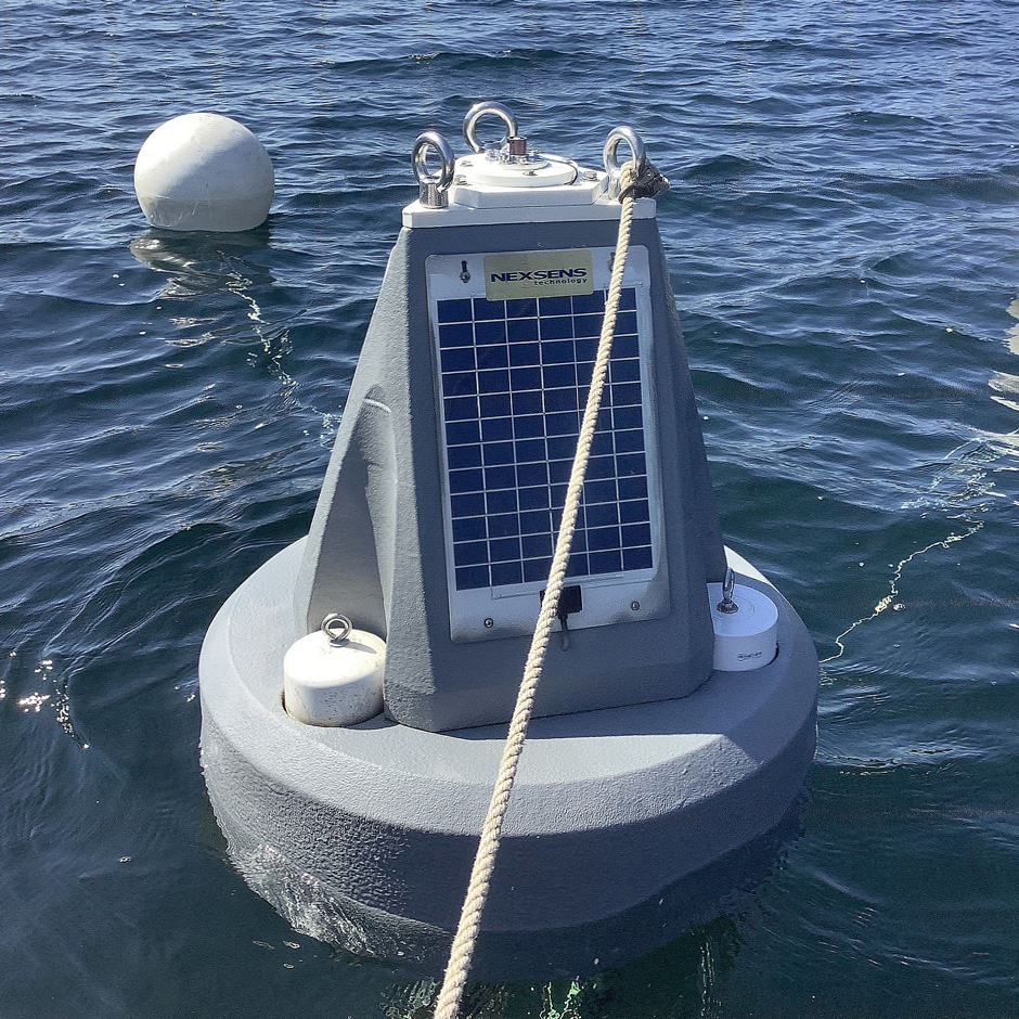 The NexSens CB-400S high-resolution monitoring buoy that has been deployed seasonally in Jordan Pond since 2013. The buoy was repainted from its original yellow hull color to make it more unobtrusive in a popular location for scenic photographs. 