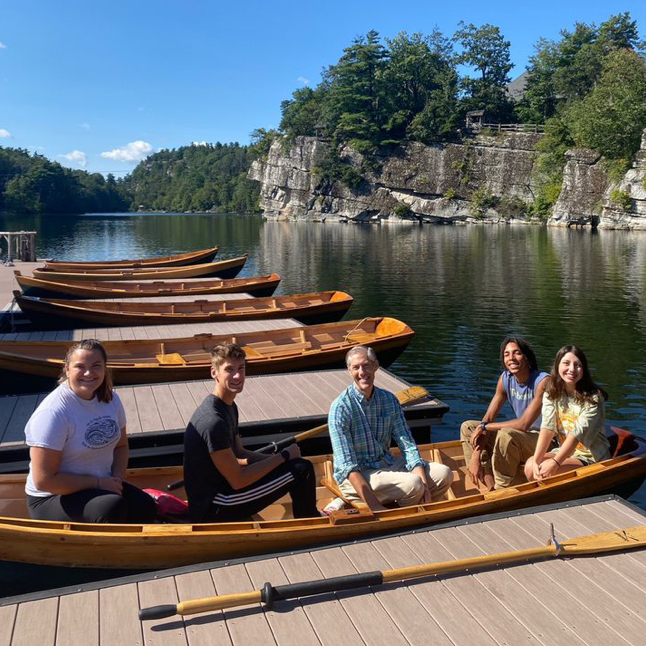  Left to right: Taylor Pazderski (senior Biology), Lucas Hoyt (senior Biology major), Dr. David Richardson, Dom Edwards (senior Biology major), and Alexia Leone (senior Biology major) during sampling at Mohonk Lake at the beginning of the fall 2023 semester. 