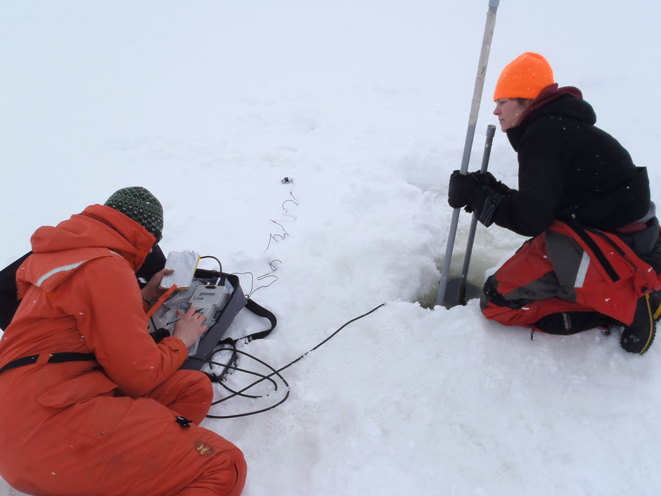 Global Institute for Water Security staff- Sheena McInnes and Heather Wilson- take under-ice profiles on a Saskatchewan reservoir, Canada. 
