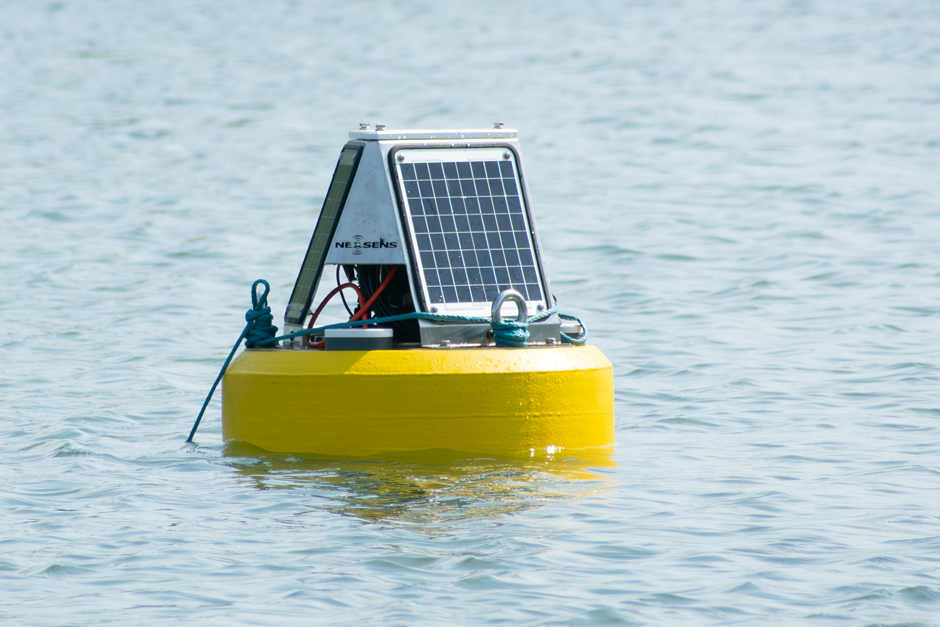 A NexSens Data Buoy collects and transmits real-time turbidity readings from the Seametrics Turbo Turbidity Logger in the Environmental Field Station pond. 