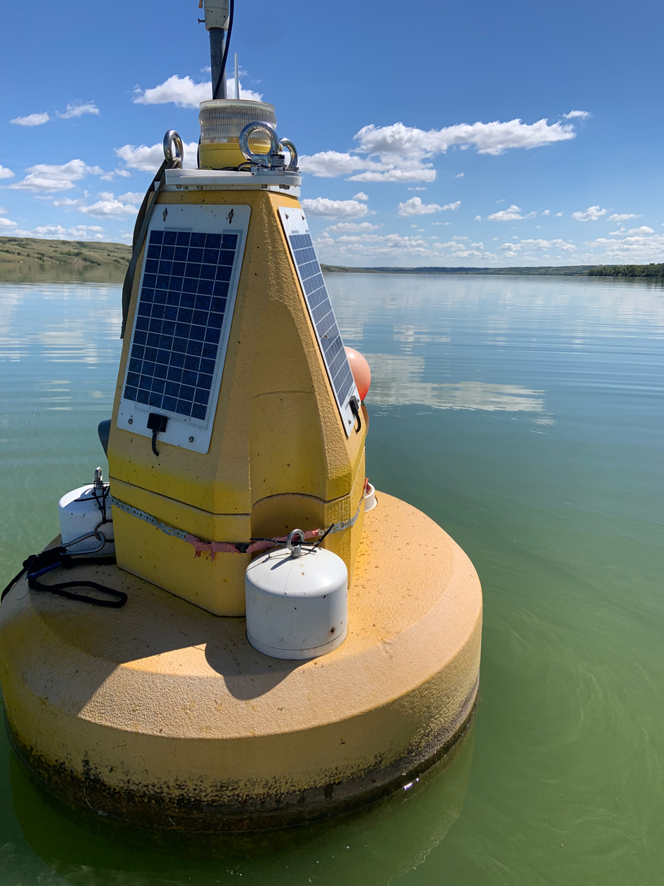 Big Buoy deployed on the green waters of Buffalo Pound Lake