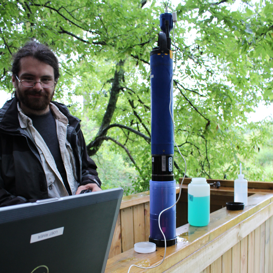 WKU CHNGES Graduate Student Bo Schaefer calibrating an EXO II sonde at Lost River Rise