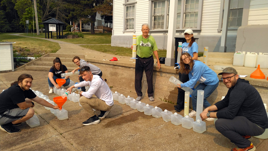 Researchers from the University of North Carolina and Bowling Green State University at Stone Lab setting up an experiment.