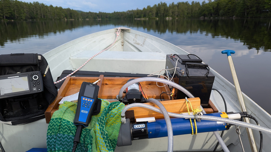 EXO2 sonde in flow-through mode using flow cell (covered in towel) as it collects surface water quality data 