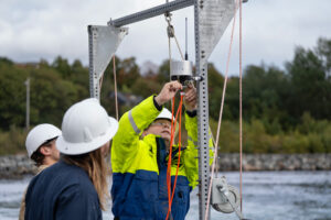 Sequoia team members installing the NexSens X3 datalogger to enable remote monitoring of sensor outputs.