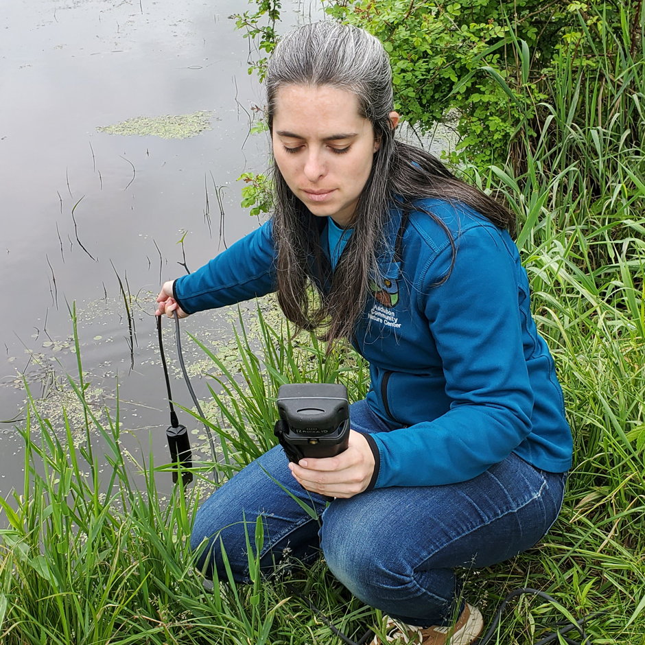 Emma Roth, Nature Educator and Animal Care Specialist, using the Pro-series handheld meter at the Audubon Community Nature Center.