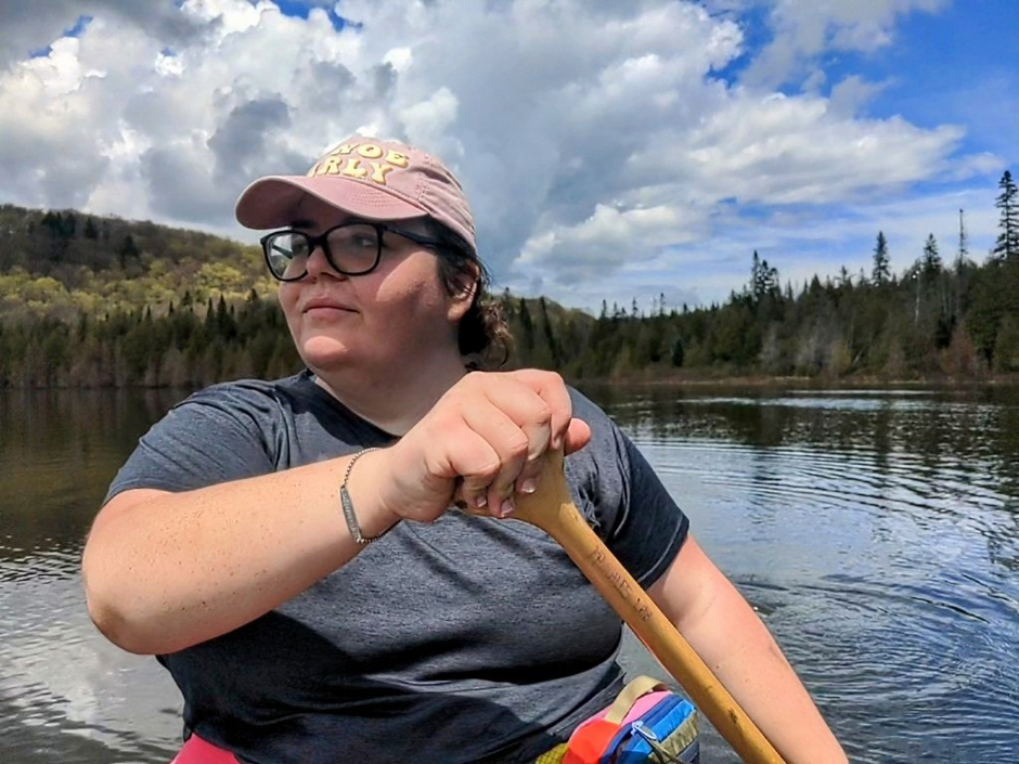 Cray paddles across a remote lake.