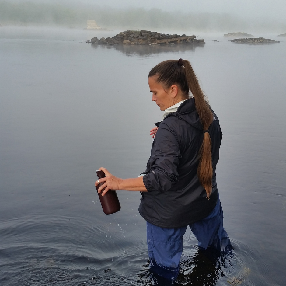 Angie Reed sampling the Penobscot River at the site of the former Great Works dam shortly after it was removed.