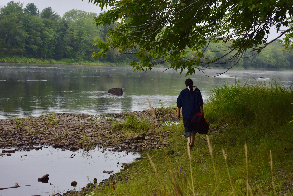 Jan Paul, Penobscot Nation citizen, walking to a sampling site.