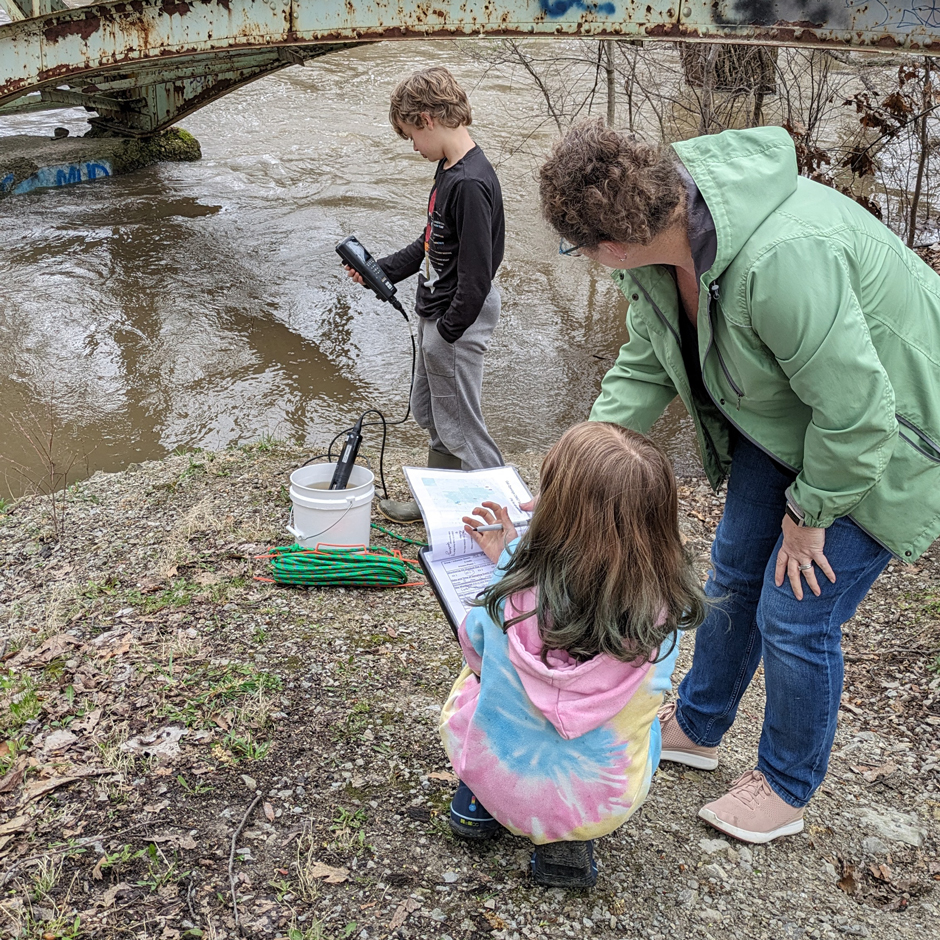 CWAT has connected volunteers of all ages with local waterways: family sampling at Highland Park in Toledo.