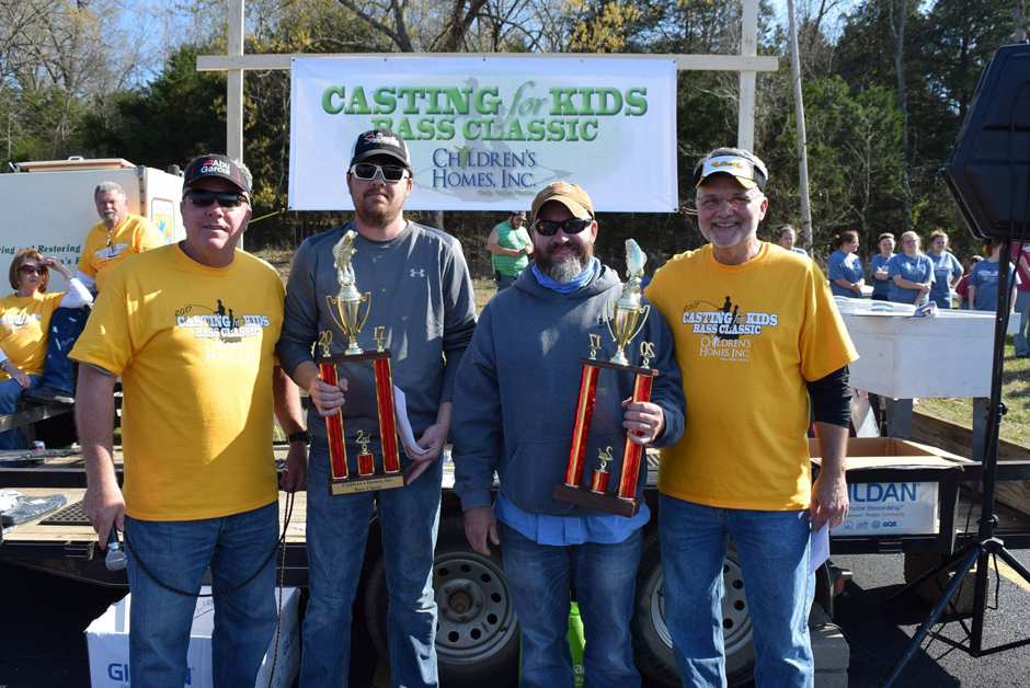 Jeremy Risley (second from left) at a bass tournament on Norfork Lake, Arkansas.