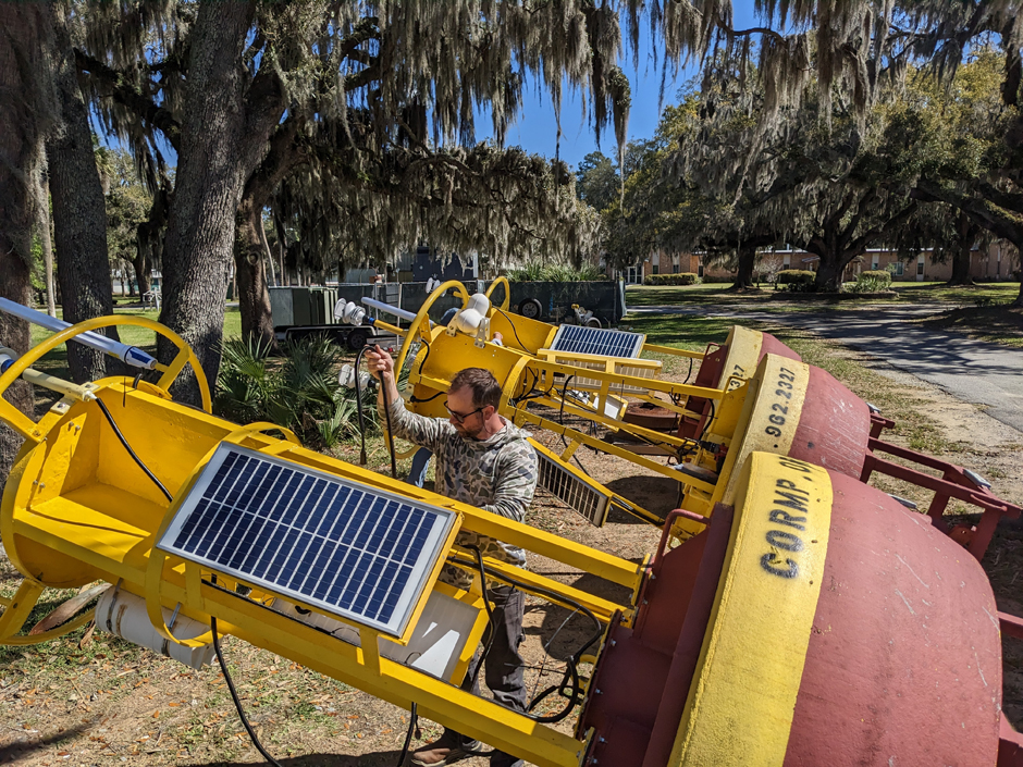 COREMP tech, Chris LaClair, installs the datalogger, power systems and sensors on new MET/OCE buoys headed for deployment off of SC.