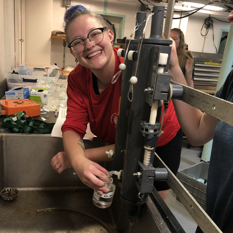 Ally sampling for total alkalinity and dissolved inorganic carbon from niskins collected at deep-sea reefs in the northern Pacific Ocean.