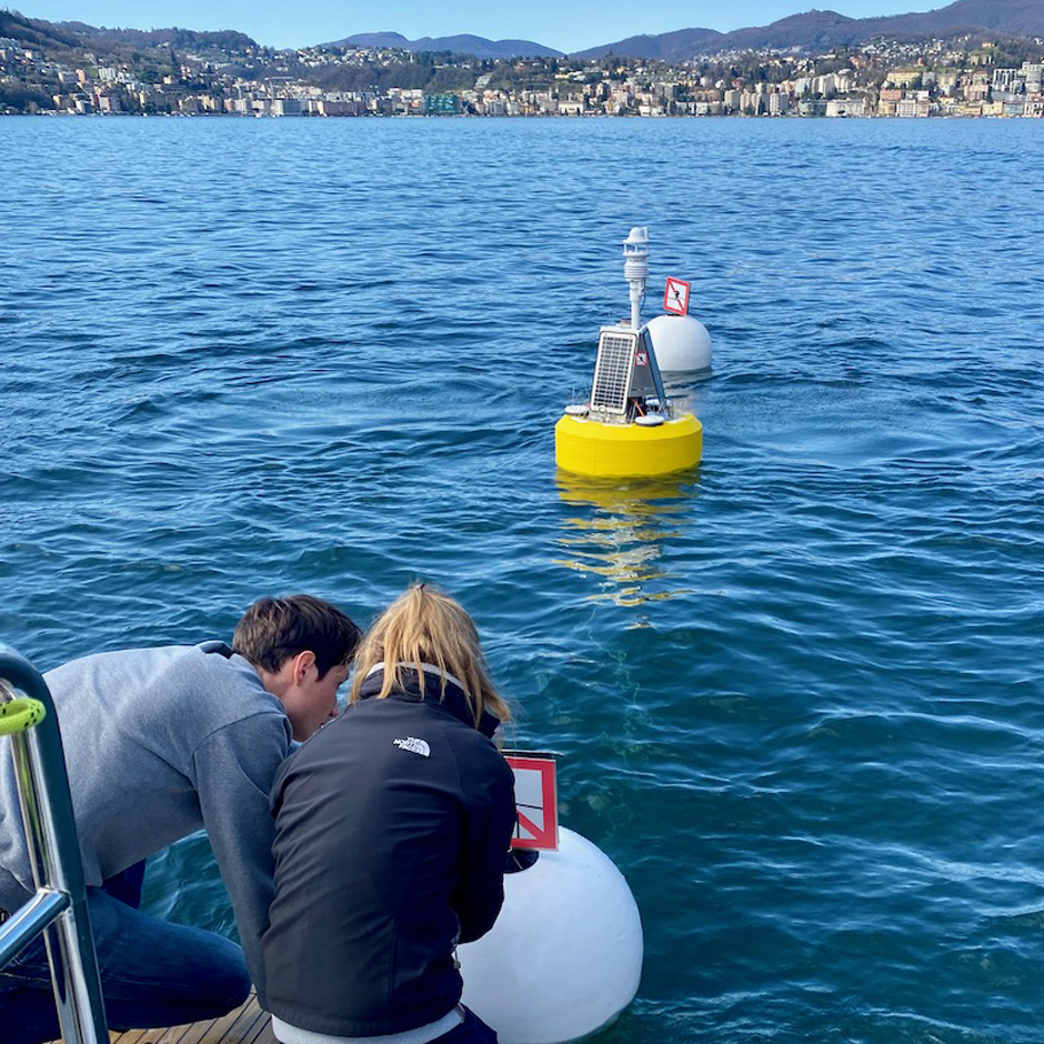 The OASI team at one of their NexSens buoys. They were first deployed in March 2024.
