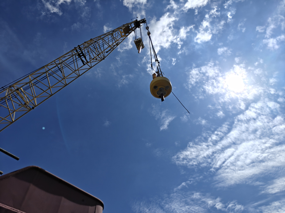 The CB-1250 is the biggest buoy in the NexSens offer. It was lifted via crane onto the barge before being taken to the deployment location.