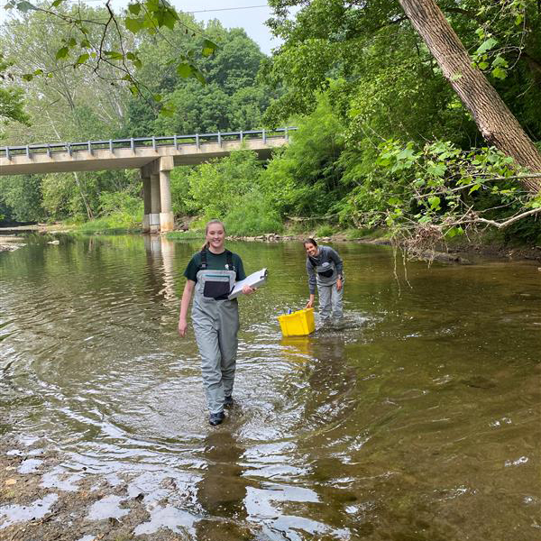 Ohio EPA water quality staff, Jenna Houdashelt (on left) and Lauren Woodgeard (on right), record field reading measurements on Alum Creek near Kilbourne, OH.
