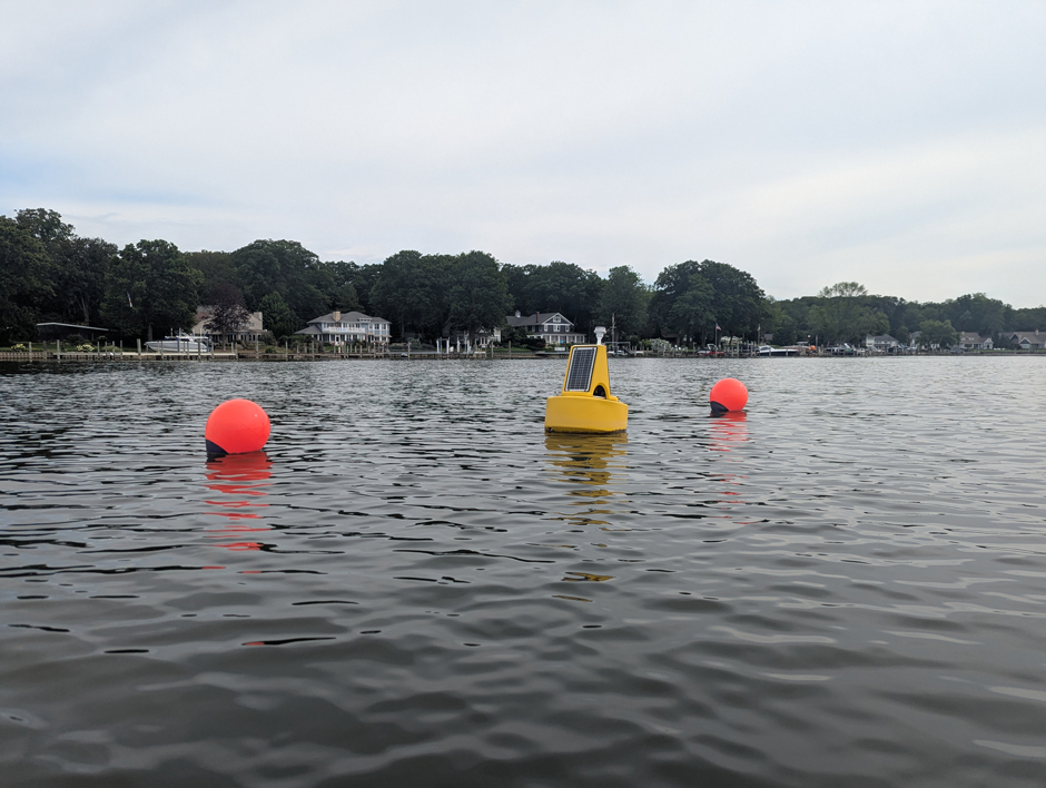 Buoy in the water on Lake Macatawa.