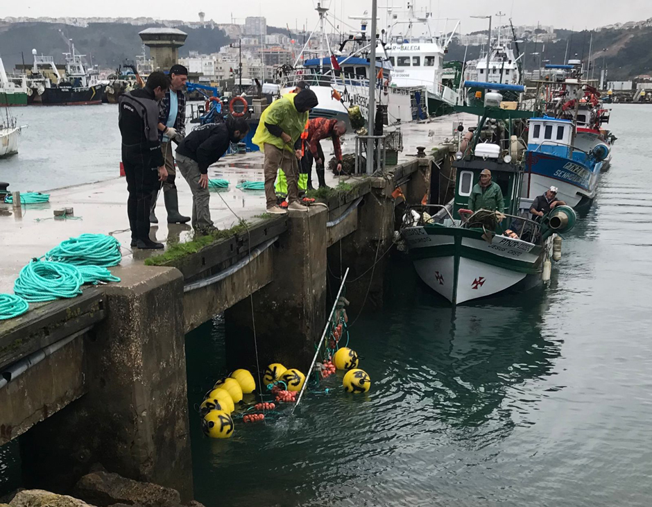 Preparing a boat launch for the seaweed farm.